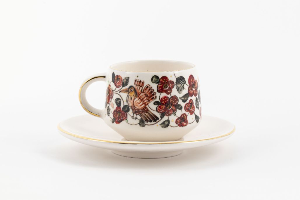 Painted Cup And Saucer - Featured Image Painted Cup And Saucer - Image 1